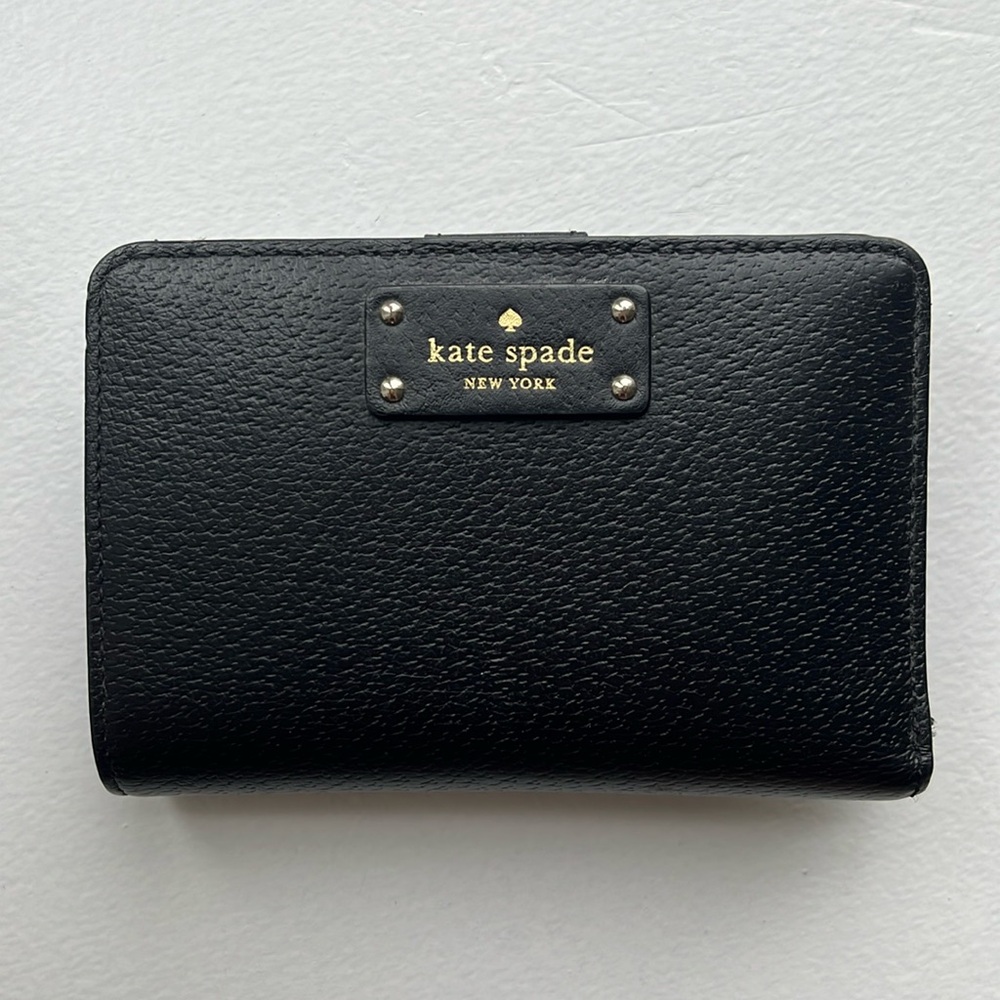 Excellent condition Kate Spade black wallet. Barely used.